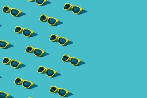 Sunglasses pattern on turquoise blue background with copy space Stock Photos