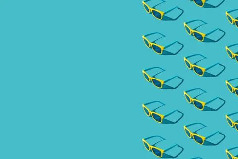 Sunglasses pattern on turquoise blue background with copy space Stock Photos