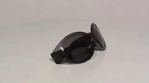 Sunglasses rotating Stock Footage 7731392