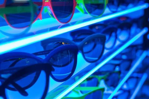 Sunglasses on shelf Stock Photos