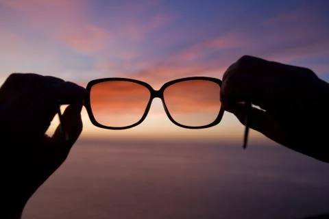 Sunglasses at sunset Foto stock