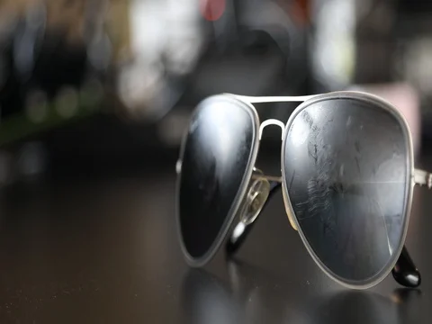 Sunglasses on Table Stock Footage 81943649