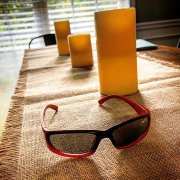 Sunglasses on table Stock Photos
