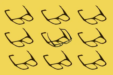 Sunglasses on yellow background pattern. Deep shadow Stock Photos