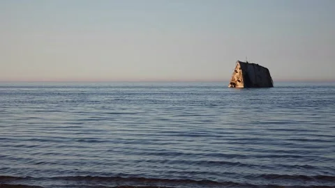 Sunken Concrete Structure Rising From Calm Sea Stock Footage 331571857