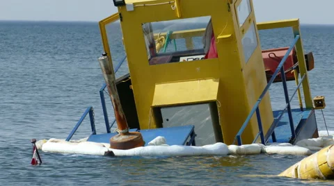 Sunken dredging barge in small port Stock-Footage 53869850