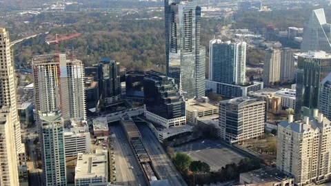 Sunken expressway and rail line slice through the Buckhead high-rises Stock Footage 104290157