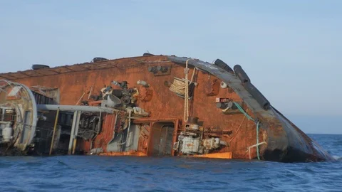 Sunken rusty ship lies on its side 4 Video stock 126971330