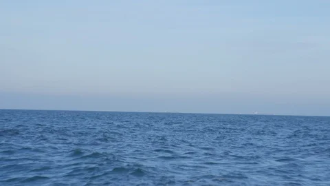 Sunken rusty ship lies on its side, pan. 3 Stock Footage 126971682