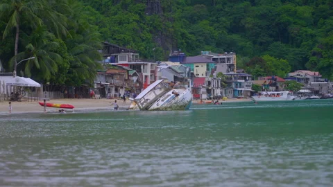 Sunken ship on the beach Stock Footage 281474386