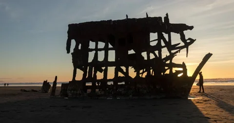 Sunken ship on beach time lapse sunset Stock Footage 165243869