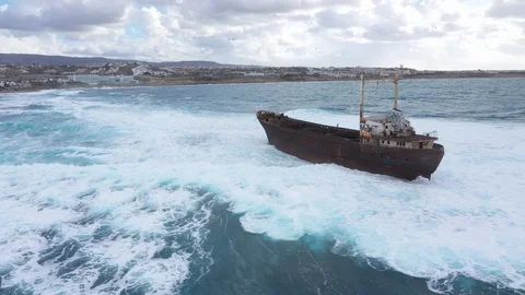Sunken Ship next to beach Stock Footage 125936541