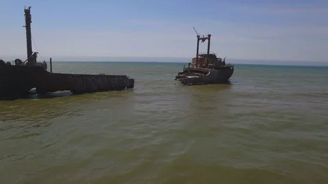 Sunken ship in the ocean with gulls Stock Footage 72221252