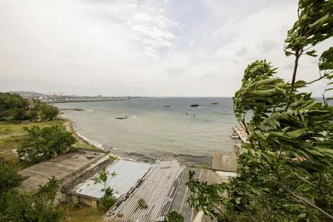 A sunken ship stranded off the coast Stock Photos