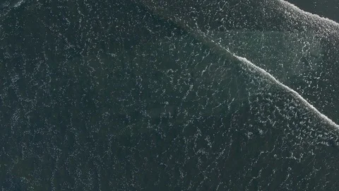 Sunken Ship Visible Beneath the Waves Видео 116520959