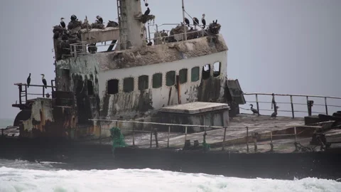 Sunken trawler, shipwreck. Old rusty metal ship Zeila at Skeleton Coast Namibia. Stock-Footage 169666761