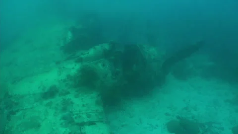 Sunken Type 1 Land Attack Aircraft in the Ocean Stock Footage 332764993