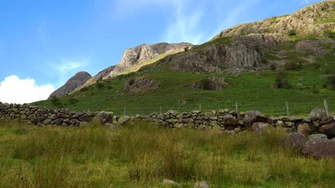 Sunkissed lake district mountain peaks Stock Footage 346921024
