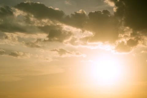 Sunlight and burst explode in cloudy blue sky clouds background Foto stock