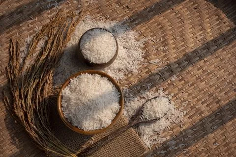 Sunlight and shadow on surface of white rice (Thai Jasmine rice) in ceramic.. Stock Photos