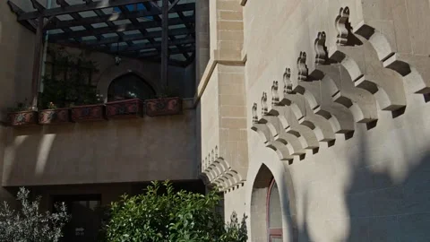 Sunlight and Shadows Moving Across Historic Stone Building Stock Footage 338244439
