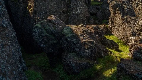 Sunlight and shadows over the canyon with moss and grass Stock Footage 73011738