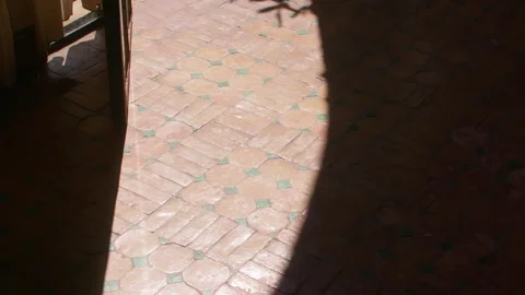 Sunlight and Shadows on Patterned Tile Floor in Traditional Marrakesh Villa Stock Footage 342716018