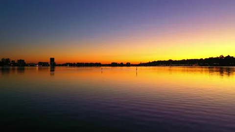 Sunlight in background while racing along water body Stock Footage 155917147