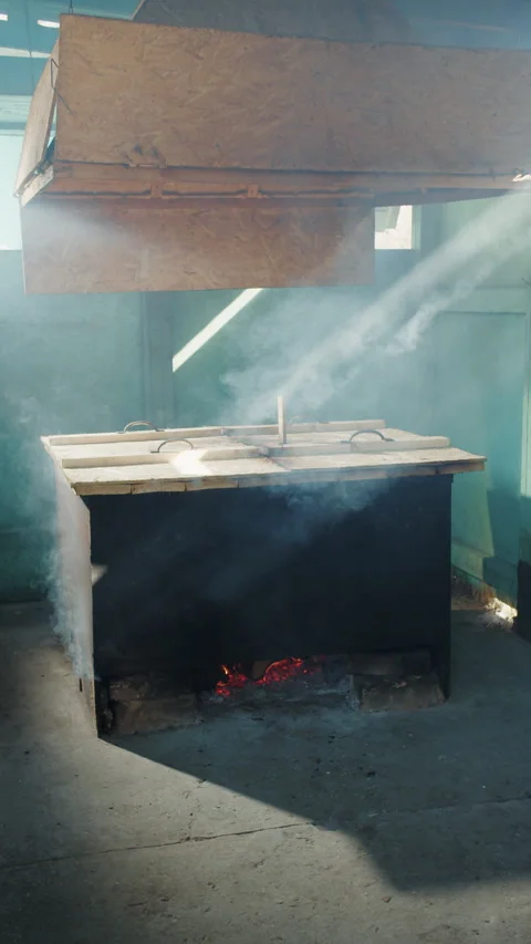 Sunlight beams through smoke in indoor smoker Stock Footage 307048116