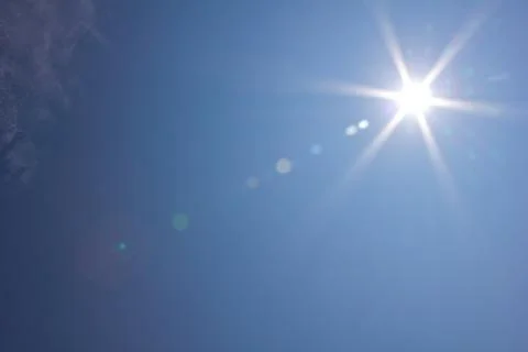 Sunlight in blue sky Stock Photos