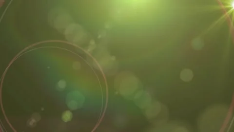Sunlight bokeh effect with soft green blur and lens flare for creative video Vidéo 347182459