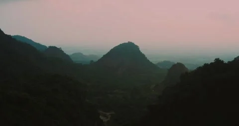 Sunlight Breaking Through Clouds Over Mountain Forest Hills Видео 331118389