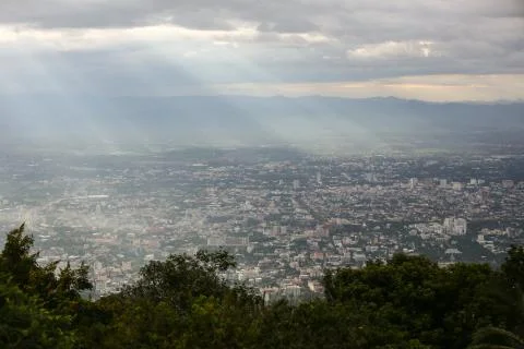Sunlight breaking through clouds over Chiang Mai Stock Photos