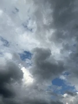 Sunlight Breaking Through Dark Storm Clouds Stock Photos