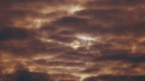 Sunlight breaking through dense clouds Stock Footage 258849636