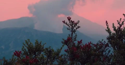 Sunlight Breaking Through Volcanic Fog Over Mount Bromo Stock Footage 329596864