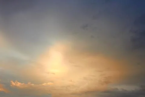 Sunlight breaks through the clouds Stock Photos