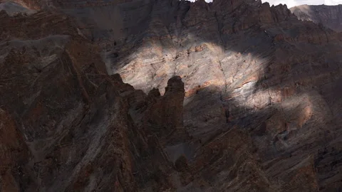 Sunlight breaks through the mountains Stock Footage 303495017