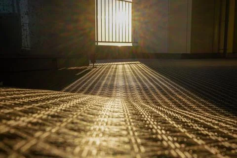 Sunlight casting patterns on tatami mat floor Stock Photos