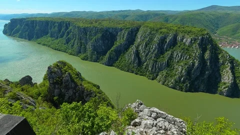 Sunlight casts shadows across deck's planks. Balkan, Eastern Europe, POV Vídeo Stock 333348720