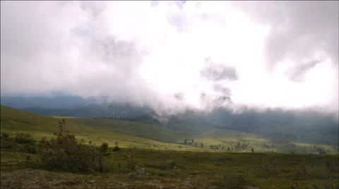 Sunlight coming through the clouds on the hill Stock Footage 40499950