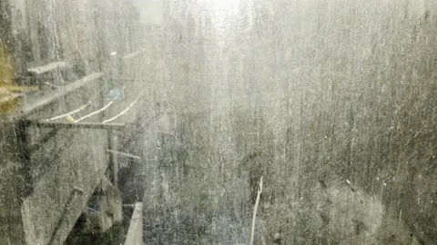 Sunlight coming through a dirty, scratched window Stock Footage 230968680