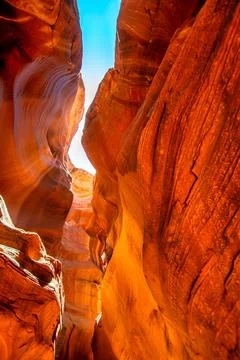 Sunlight creating dramatic patterns on sand and rock formations inside Ante.. Stock Photos