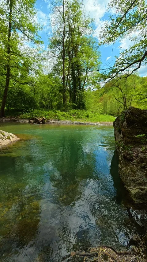 Sunlight dances on the surface. Vertical POV, Balkan, Eastern Europe 스톡 동영상 334680624