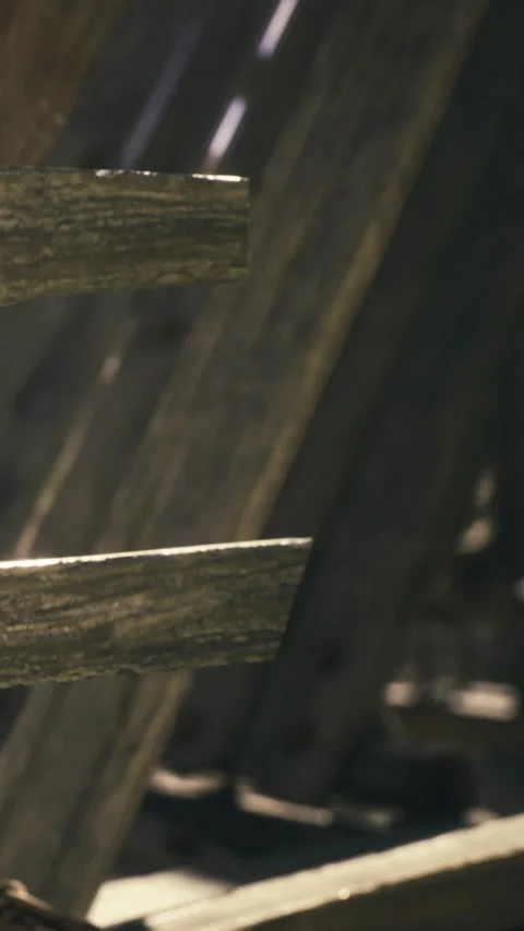 Sunlight dances on weathered wood at a rustic seaside dock during midday Stock Footage 331798936