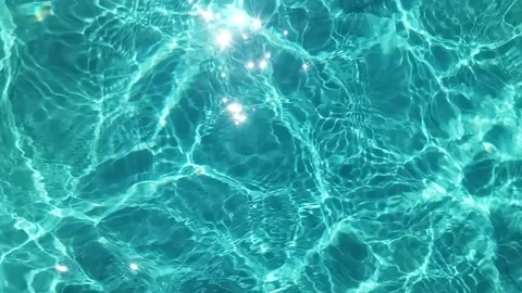 Sunlight Dancing on Blue Water Surface Stock Footage 339214301