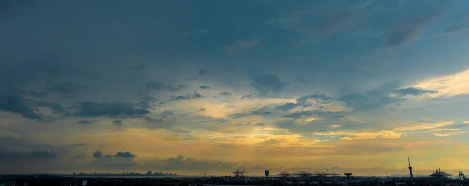 Sunlight with dramatic sky on dark background during sunset. cloudscape in ci 스톡 사진