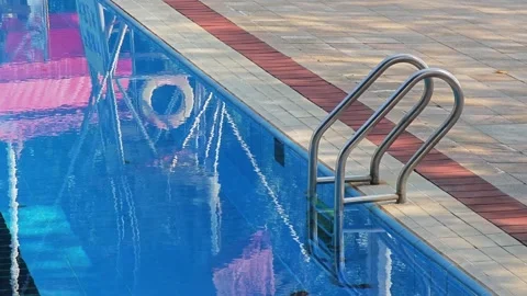 Sunlight with empty Swimming pool Stock Footage 325437672