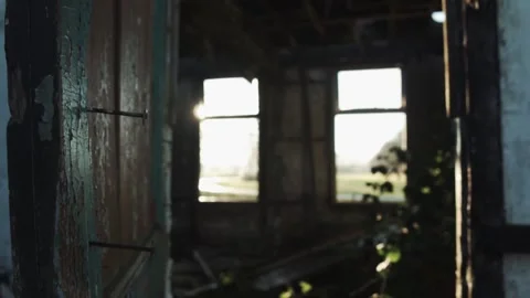 Sunlight entering abandoned building through windows Stock Footage 289663454
