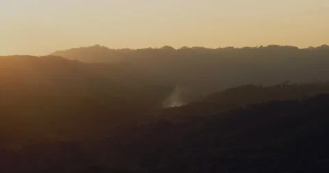 Sunlight Fading Over Tropical Rainforest at Sunset Aerial Scene Video stock 332349320